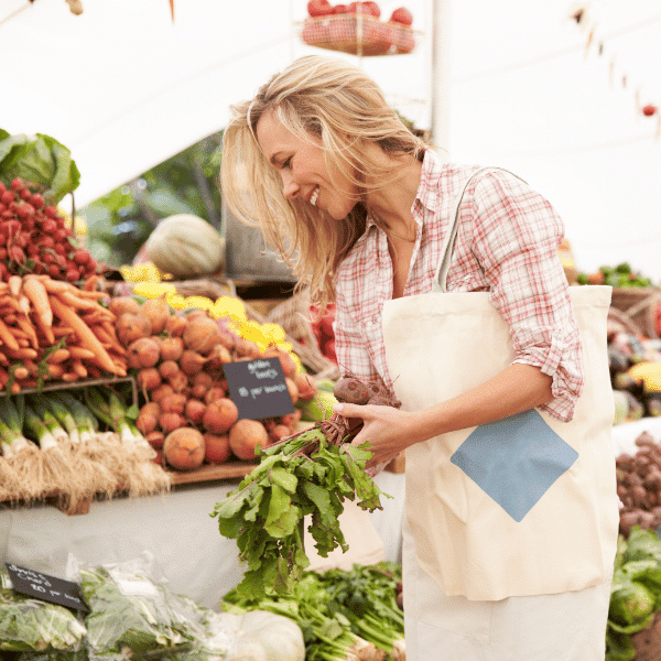 A woman shopping for fresh produce at Nolensville Farmers Market in Nolensville, TN.